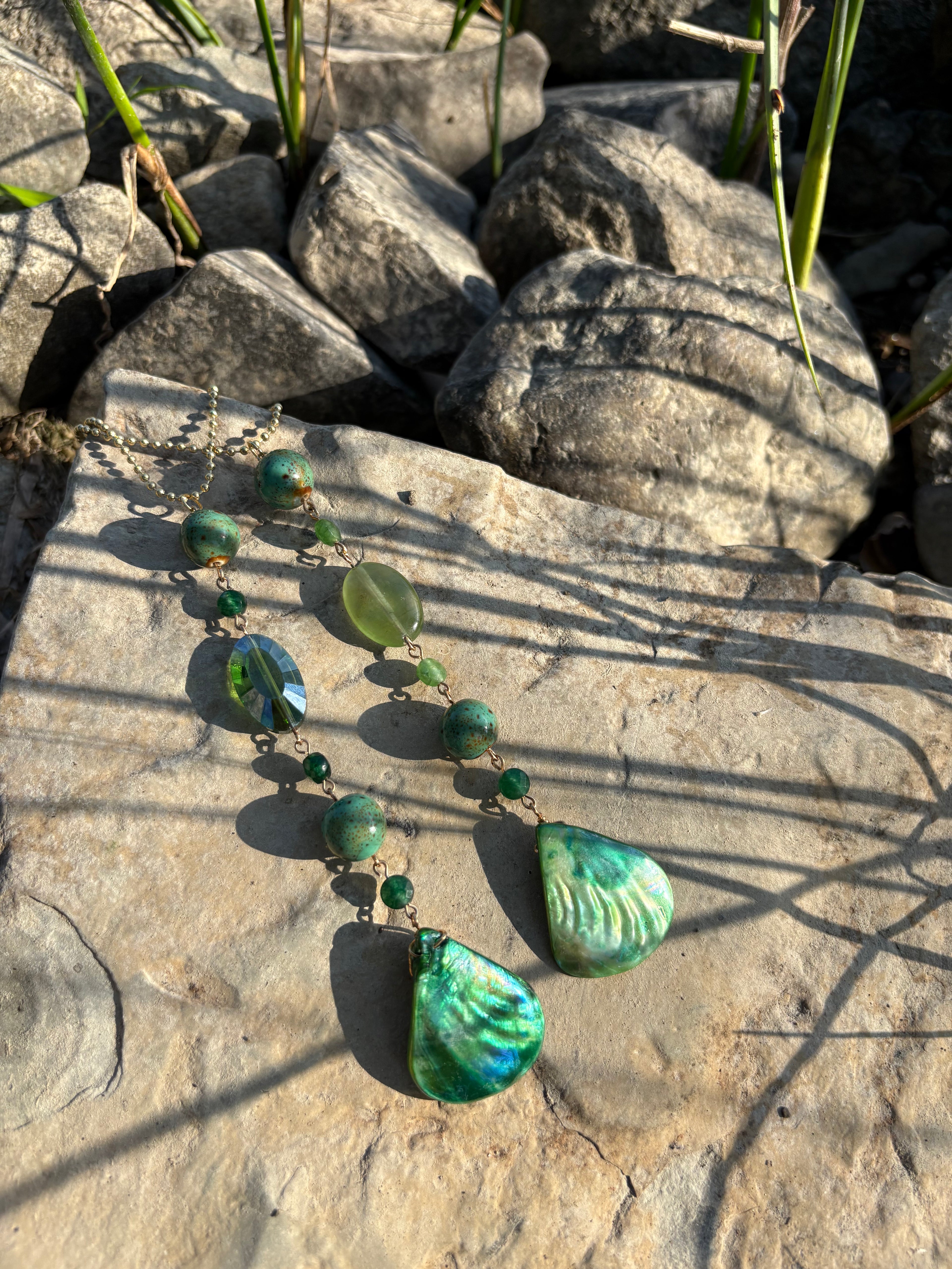 green mother of pearl charm