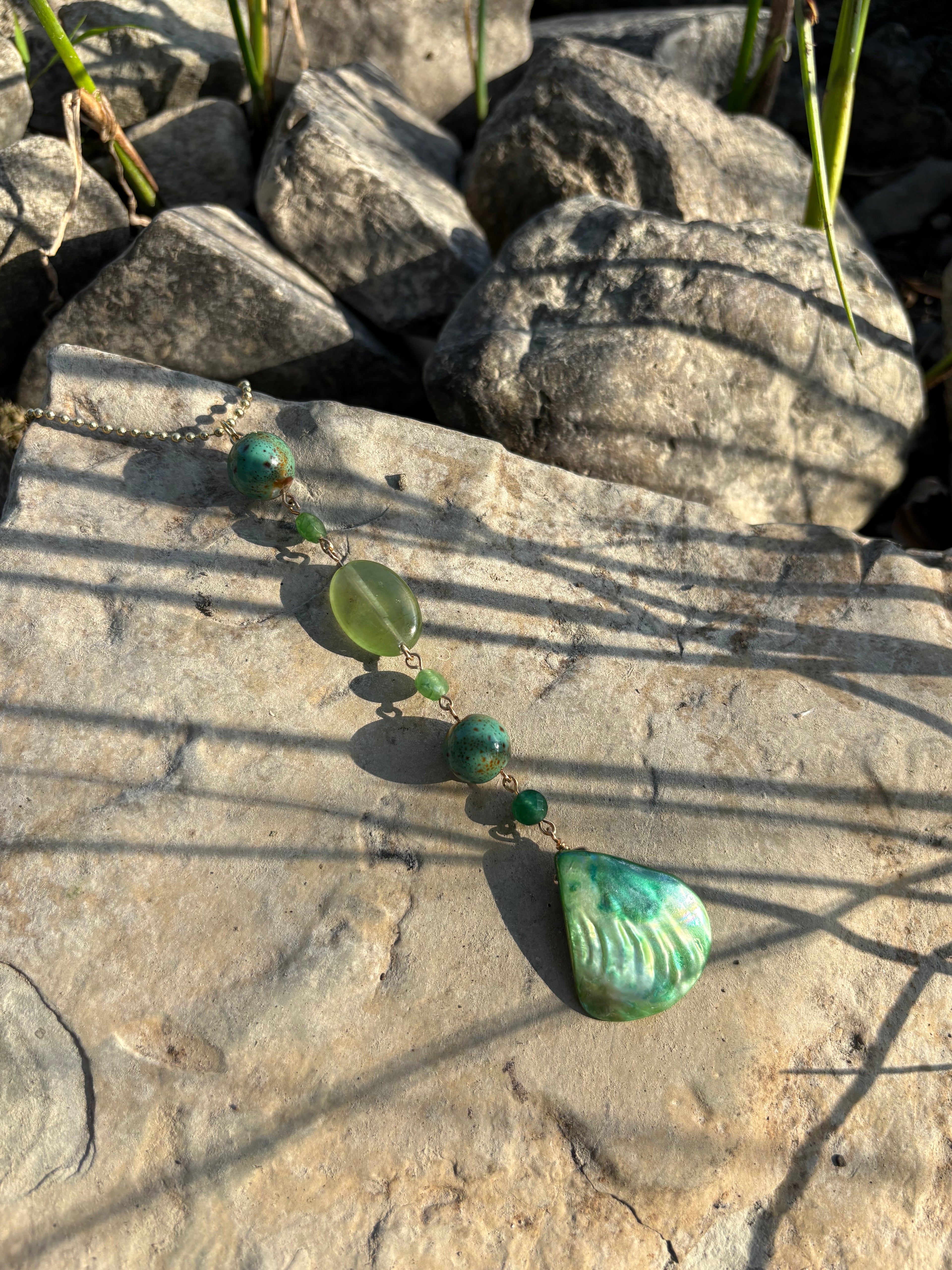 green mother of pearl charm
