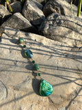 green mother of pearl charm