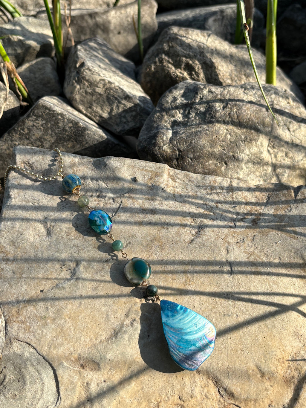 blue mother of pearl charm