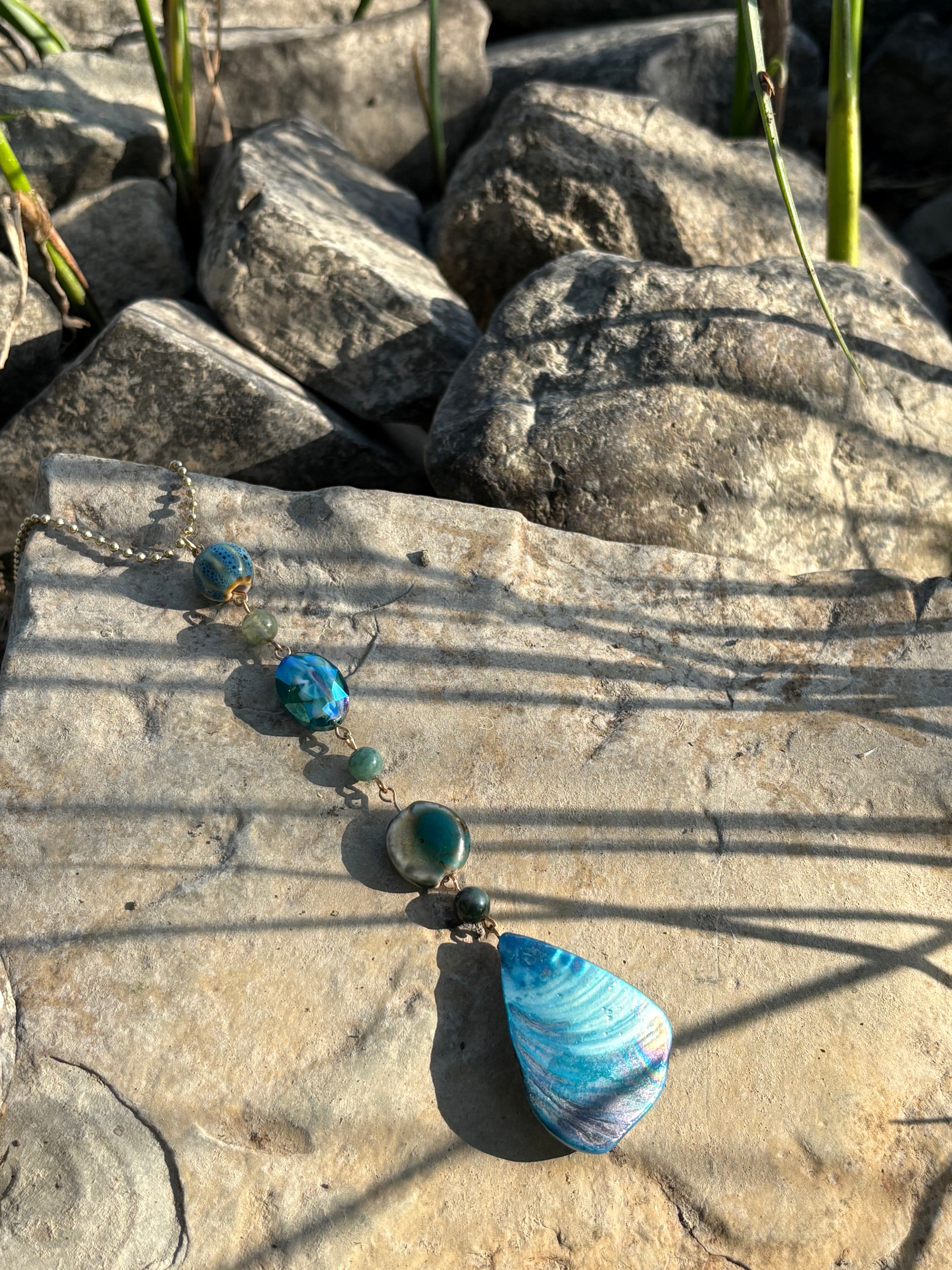 blue mother of pearl charm